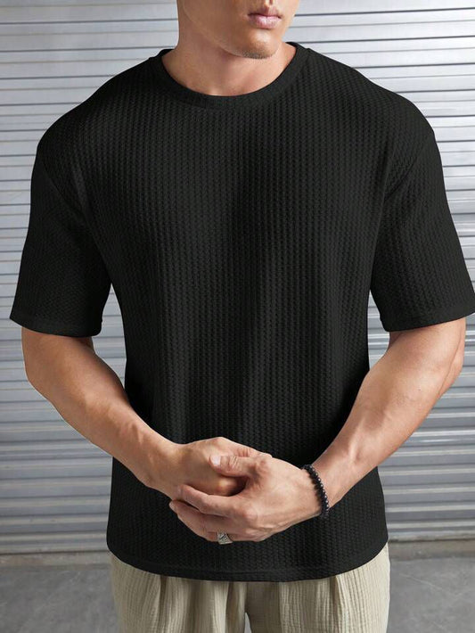 T-shirt à épaules tombantes en tricot gaufré pour homme, noir